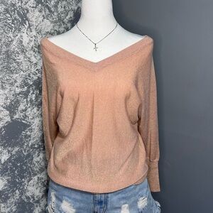 Off the shoulders shimmery bat wing style top